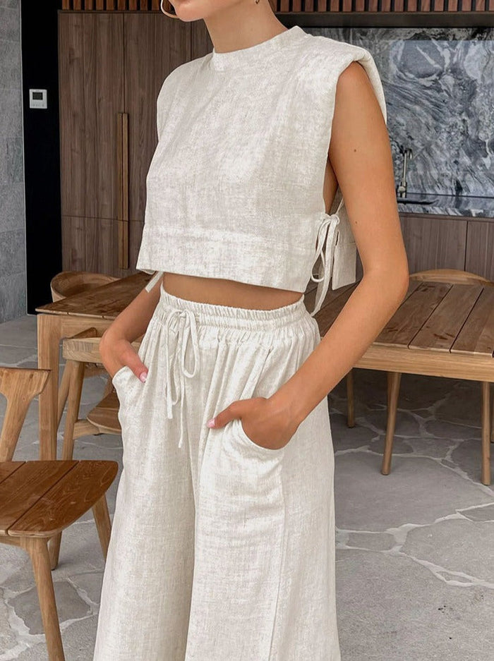 Modern summer outfit with crop top and wide-leg pants