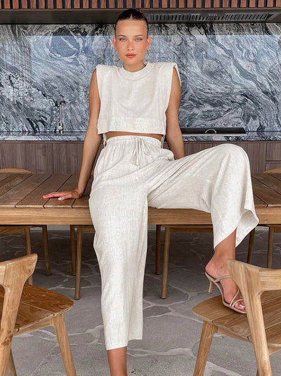 Modern summer outfit with crop top and wide-leg pants