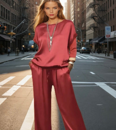 Women's loose-fitting set with a short-sleeved T-shirt and wide-legged trousers in a modern style
