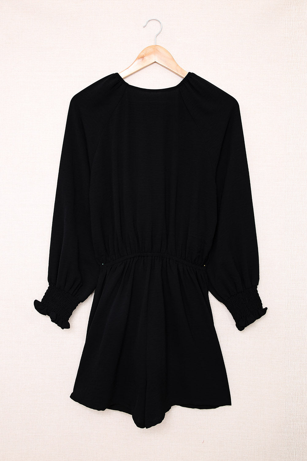 Linda - Deep V-neck Jumpsuit with Tied Ruffle Sleeves