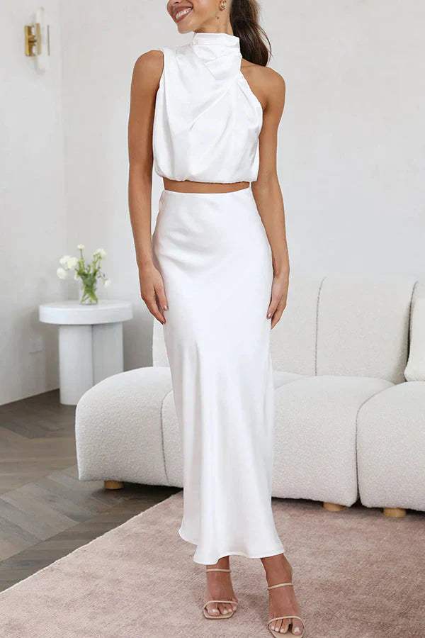 Elegant women's set with a sophisticated top and a flowing long skirt