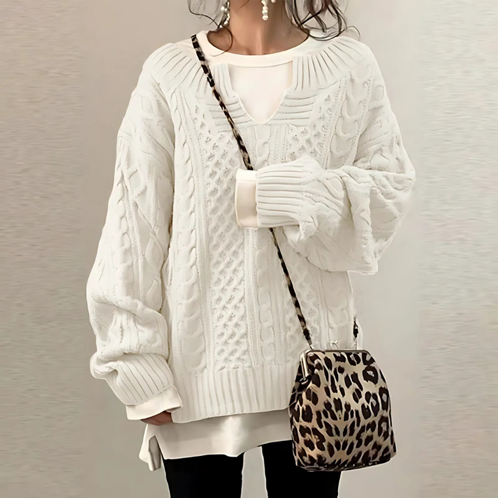 Elegant women's sweater with an open neck and loose style