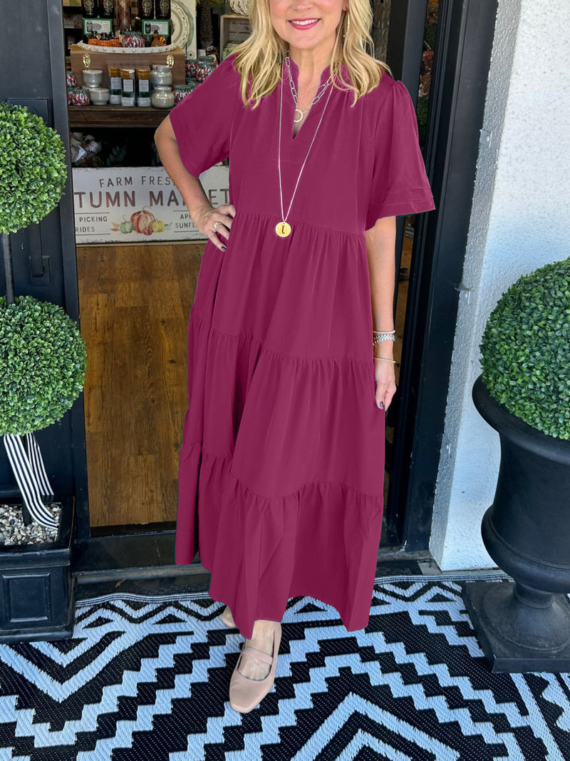 V-neck midi dress with layered skirt and pockets