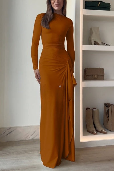 Elegant evening dress with long sleeves and draped