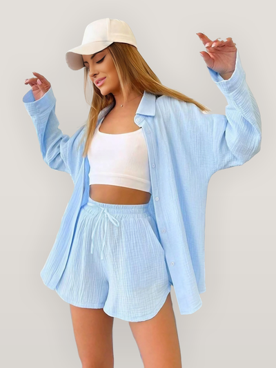 Casual outfit with a long-sleeved button-down shirt and modern shorts