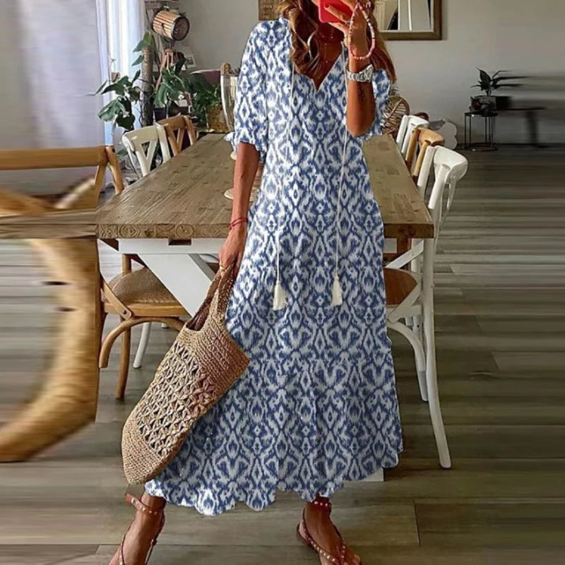 Bohemian style maxi dress with floral print and short sleeves