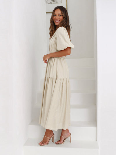 Sophisticated women's dress with contemporary puff sleeves
