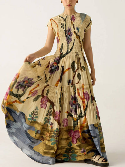 Long flowing dress with artistic print and short sleeves