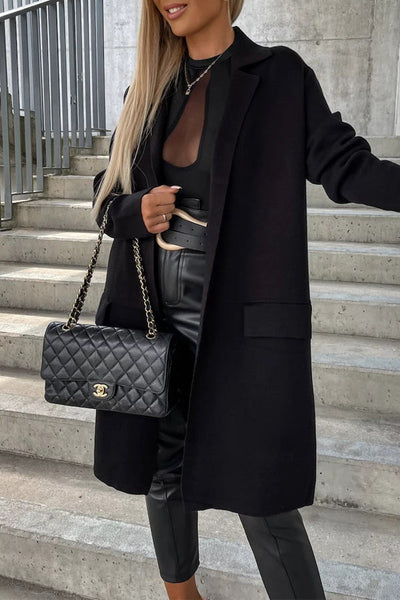 Elegant coat with pockets and a turn-down collar: the perfect style for any occasion