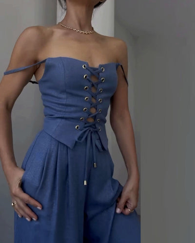 Two-piece set with a thin strap knotted top and flowing straight-leg pants