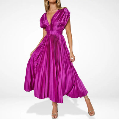 Long pleated dress with a plunging neckline and elegant style