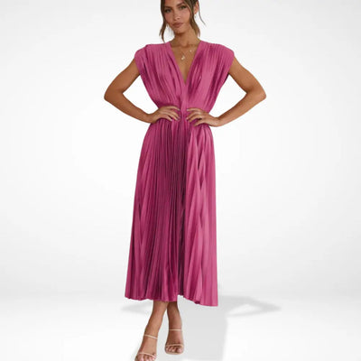 Long pleated dress with a plunging neckline and elegant style