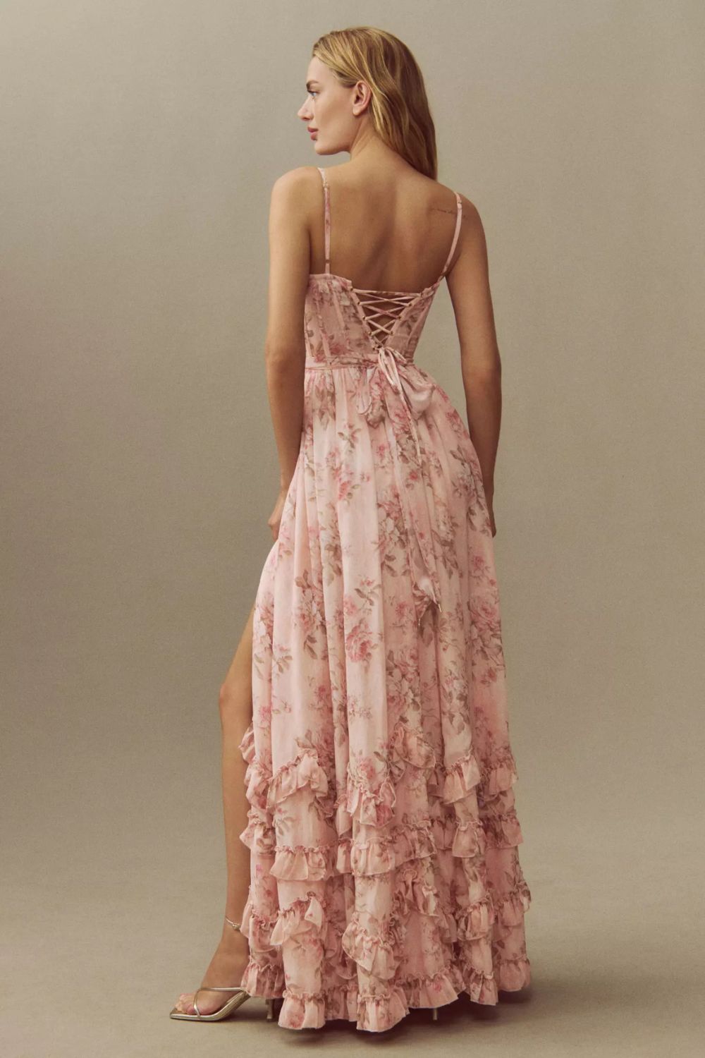 Long corset dress with thin straps and ruffled hem in a floral design