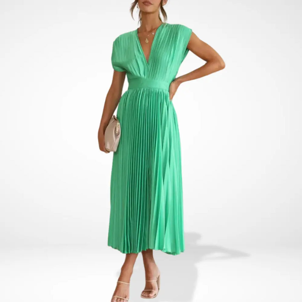 Long pleated dress with a plunging neckline and elegant style