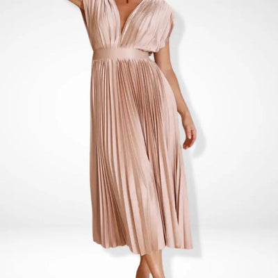 Long pleated dress with a plunging neckline and elegant style