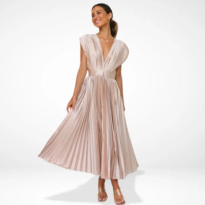 Long pleated dress with a plunging neckline and elegant style