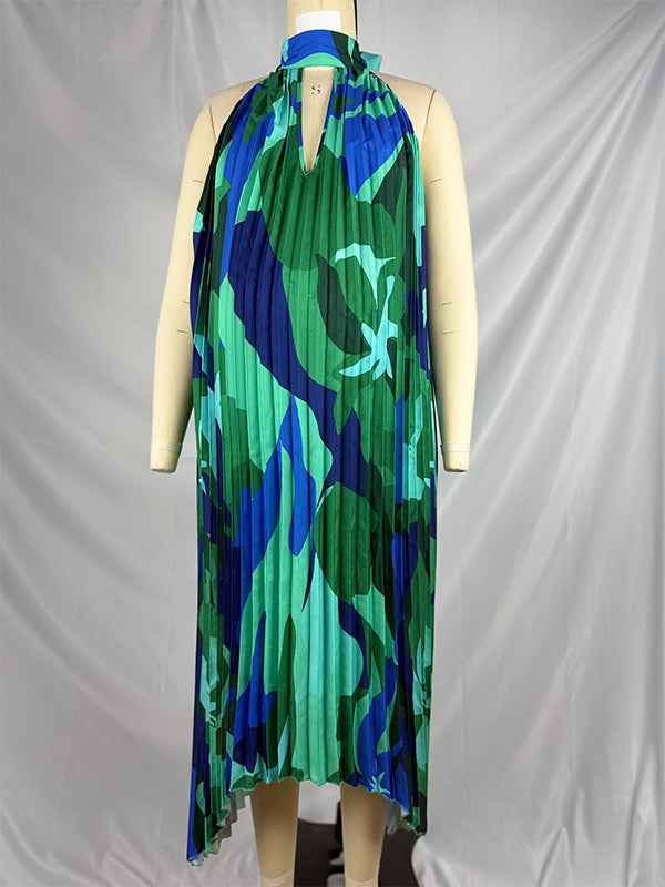 Elegant long maternity dress with pleats and print, ideal for celebrations
