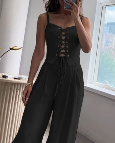 Two-piece set with a thin strap knotted top and flowing straight-leg pants