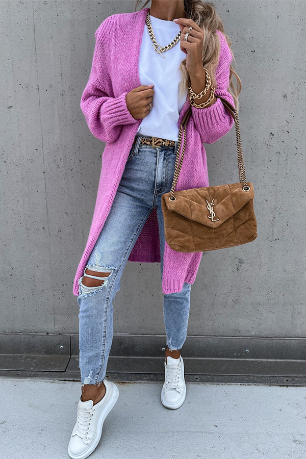 Elegant cardigan with long sleeves and a deep V-neckline for a sophisticated style