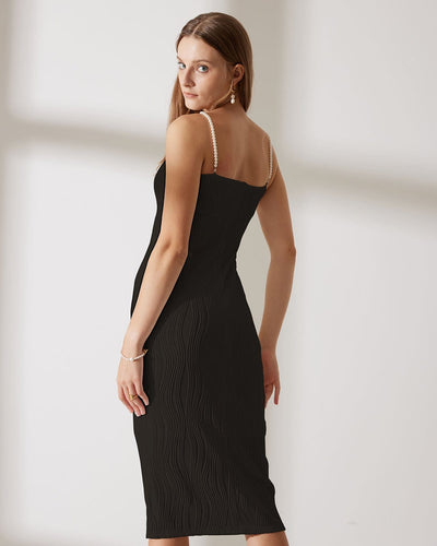 Sleeveless midi dress with delicate straps and refined style