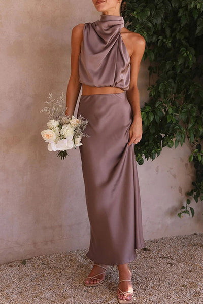 Elegant two-piece set with sleeveless top and long skirt