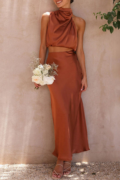Elegant two-piece set with sleeveless top and long skirt