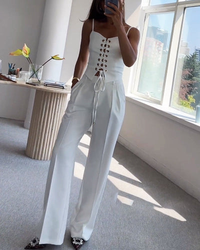 Two-piece set with a thin strap knotted top and flowing straight-leg pants