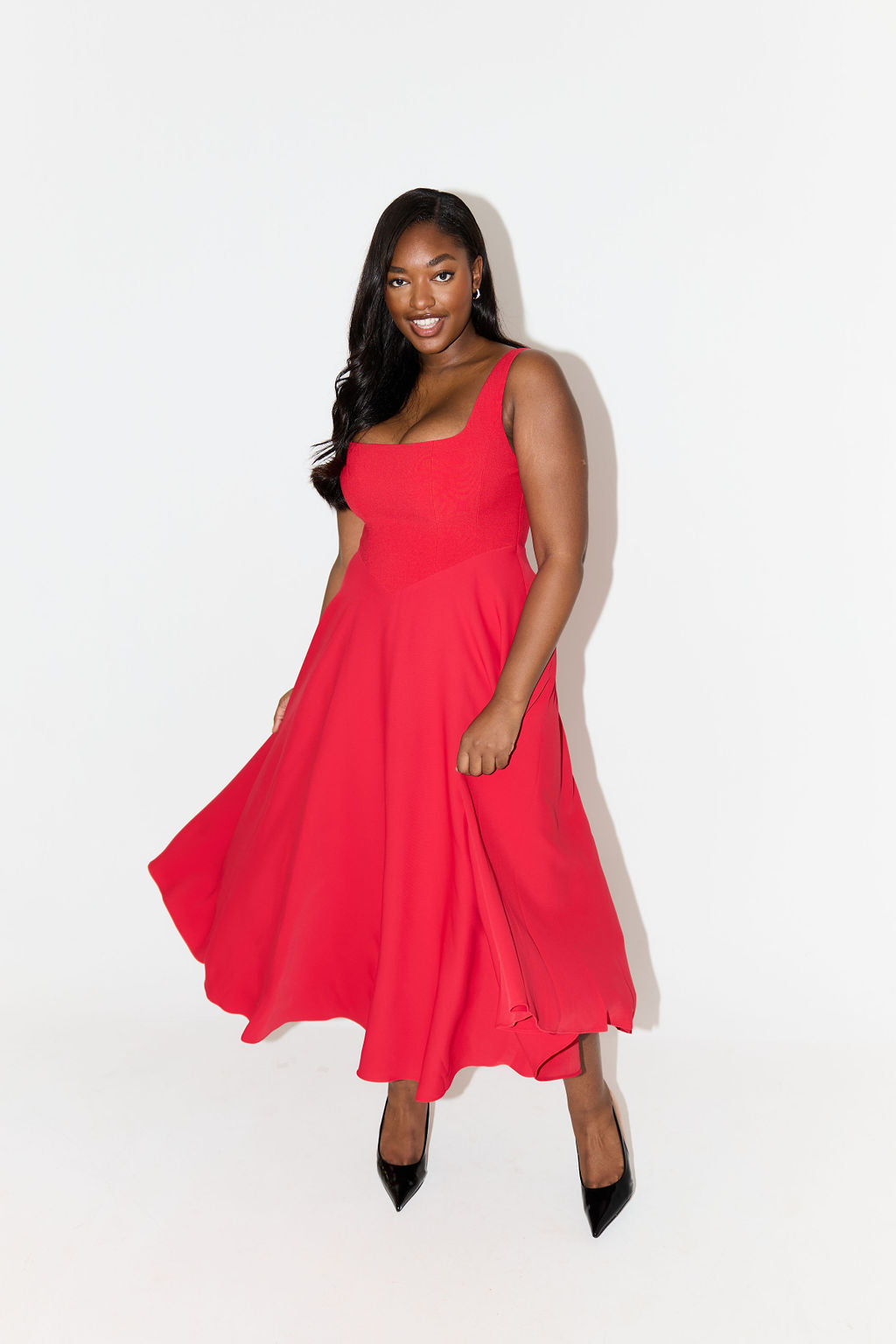 Elegant midi dress for women with a sophisticated and versatile design