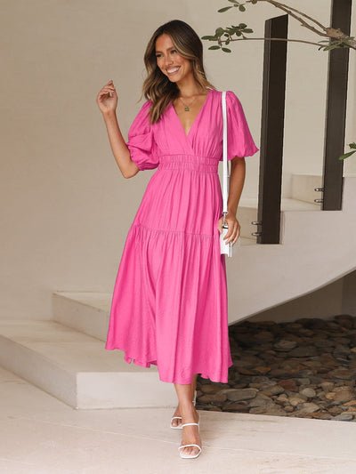 Sophisticated women's dress with contemporary puff sleeves