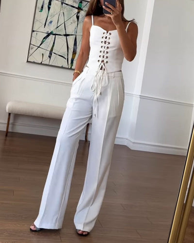 Two-piece set with a thin strap knotted top and flowing straight-leg pants
