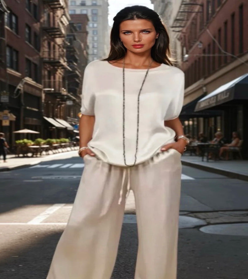 Women's loose-fitting set with a short-sleeved T-shirt and wide-legged trousers in a modern style