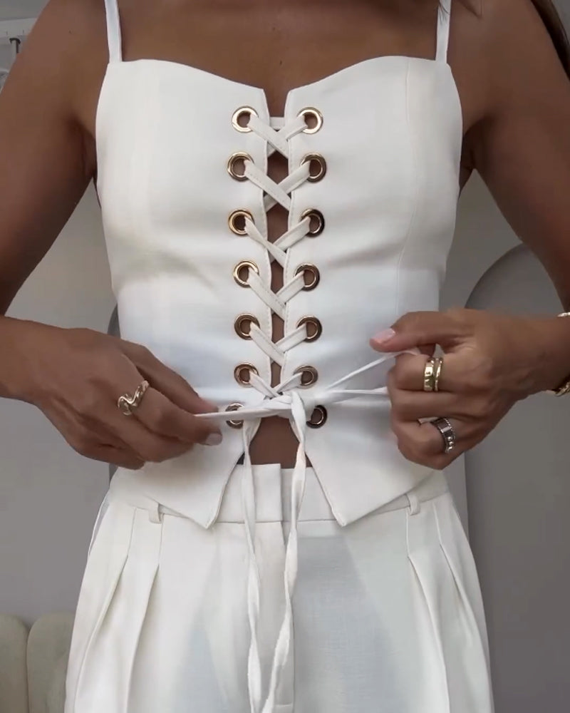 Two-piece set with a thin strap knotted top and flowing straight-leg pants