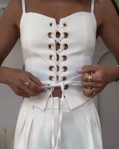 Two-piece set with a thin strap knotted top and flowing straight-leg pants