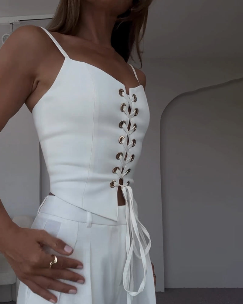 Two-piece set with a thin strap knotted top and flowing straight-leg pants