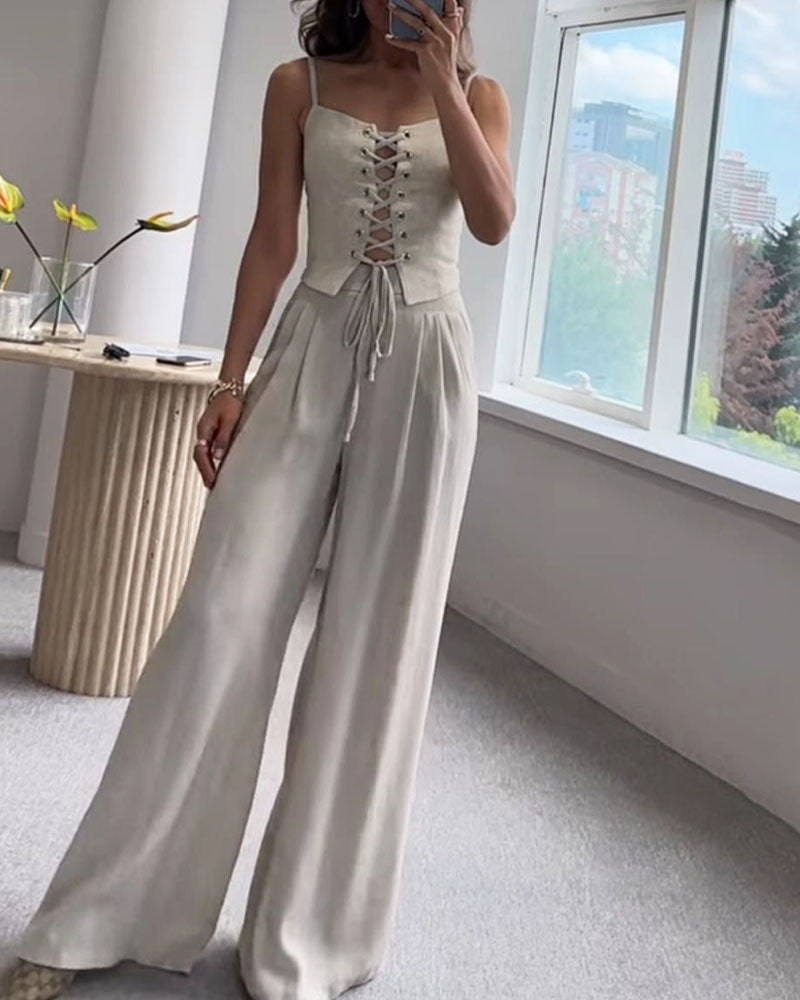 Two-piece set with a thin strap knotted top and flowing straight-leg pants