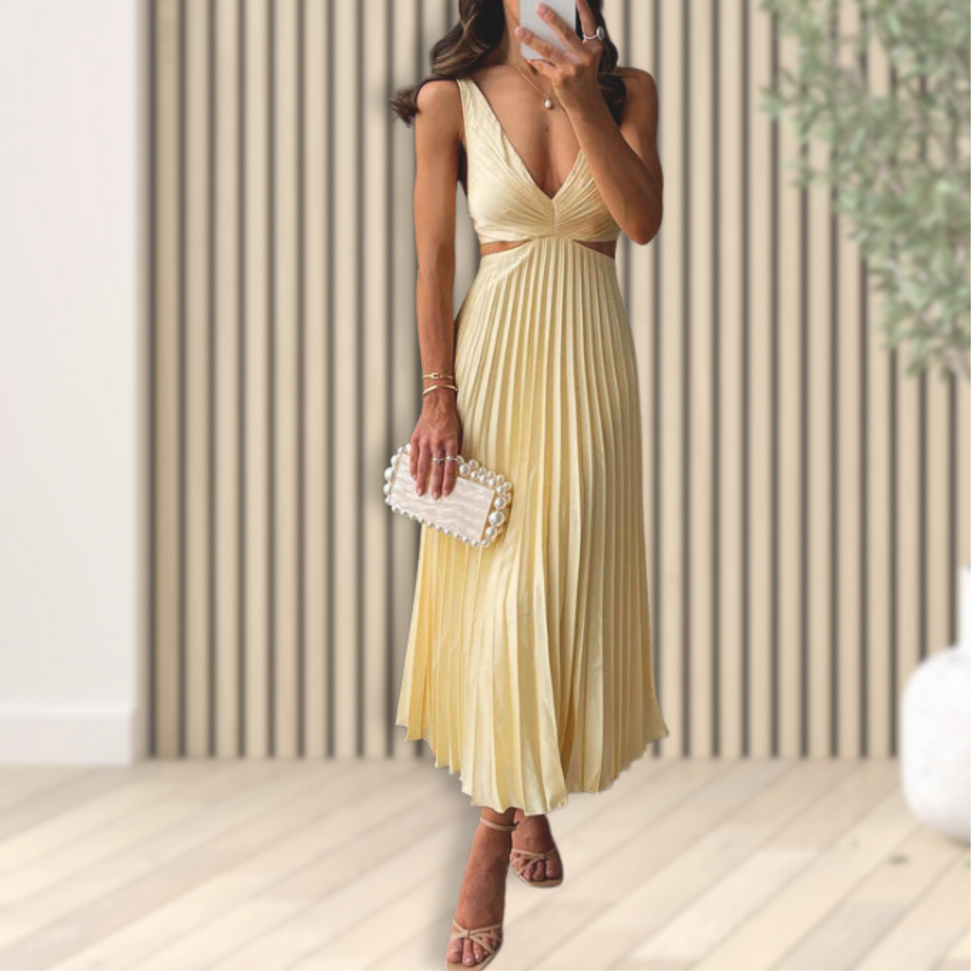Pleated dress with elegant design and sophisticated finish