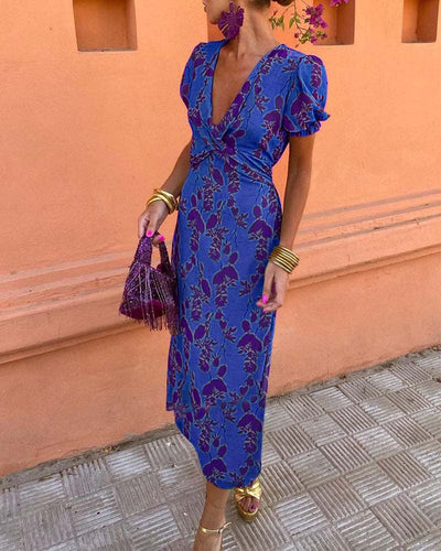 Floral print midi dress with a V-neckline, ideal for any occasion