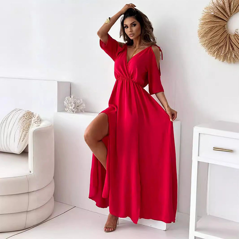Elegant long dress with a crossover neckline and flowing side slit