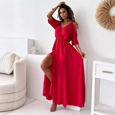 Elegant long dress with a crossover neckline and flowing side slit