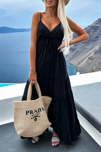 Elegant long dress with a V-neckline and pleated layered skirt, ideal for any occasion