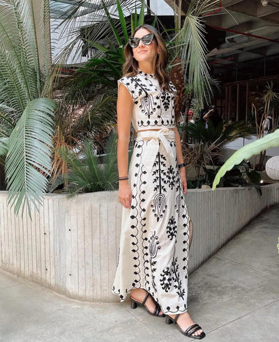 Printed sleeveless top and flowing skirt set, ideal for casual events