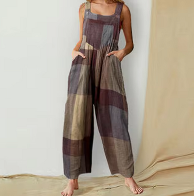 Gina – Loose-fitting jumpsuit with thin straps and a modern urban print