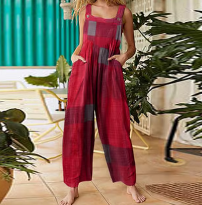 Gina – Loose-fitting jumpsuit with thin straps and a modern urban print