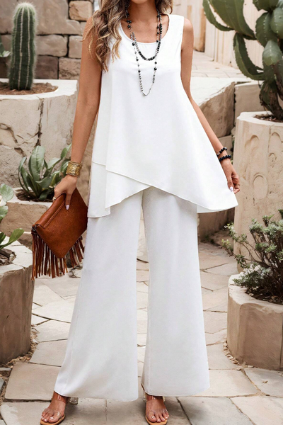 Elegant summer set for women with wide short-sleeved blouse and wide-leg pants