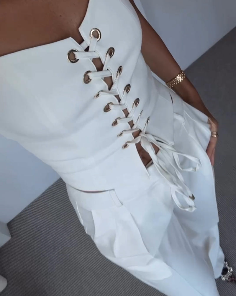 Two-piece set with a thin strap knotted top and flowing straight-leg pants