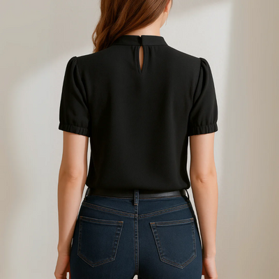 Flowy blouse with a high neck and slits on the short sleeves