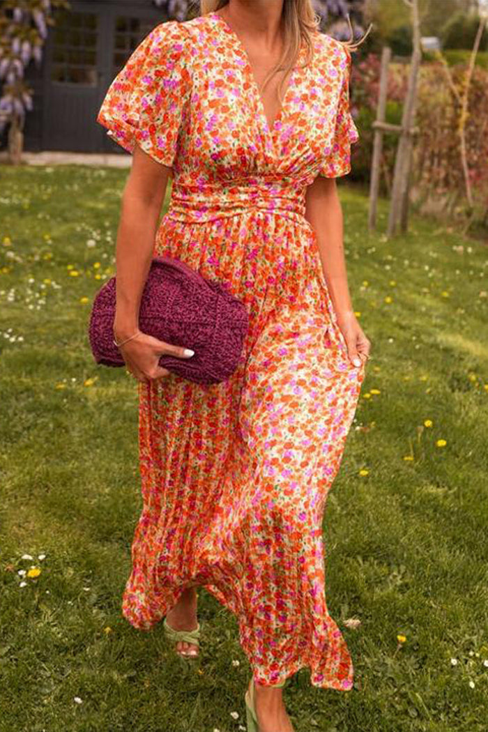 Elegant long dress with floral print and flowing design