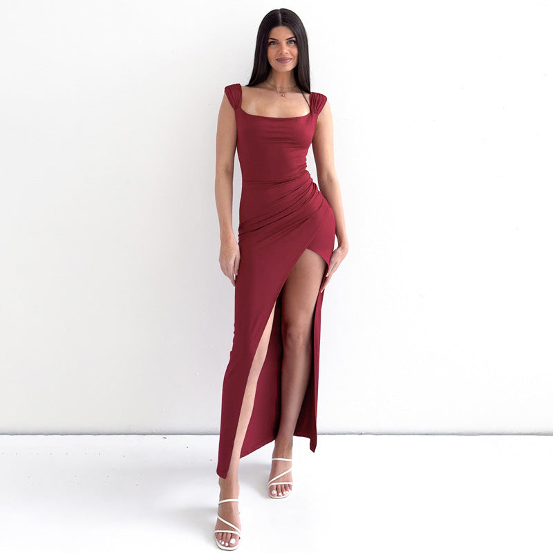 Long sleeveless dress with square neckline and elegant side slit