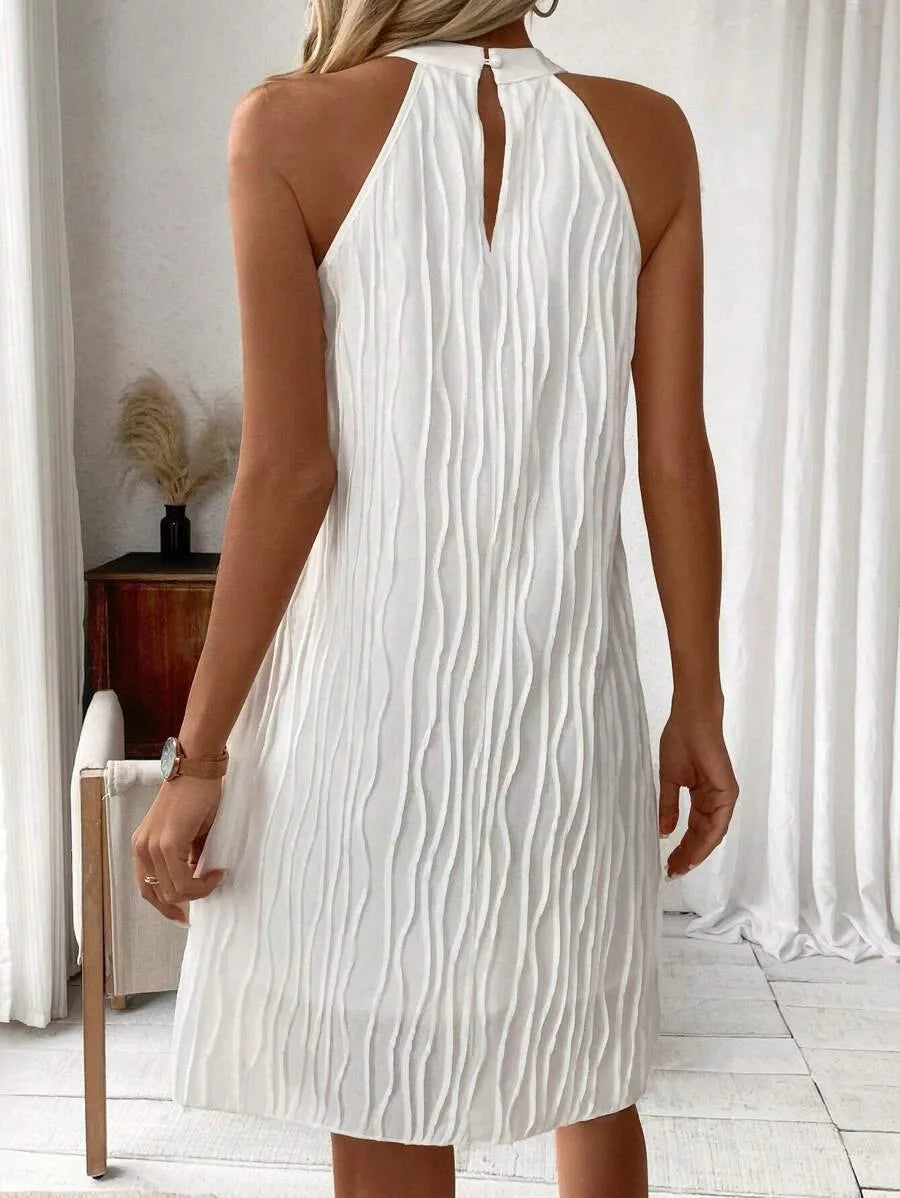 Elsie - Captivating sleeveless backless mini dress
