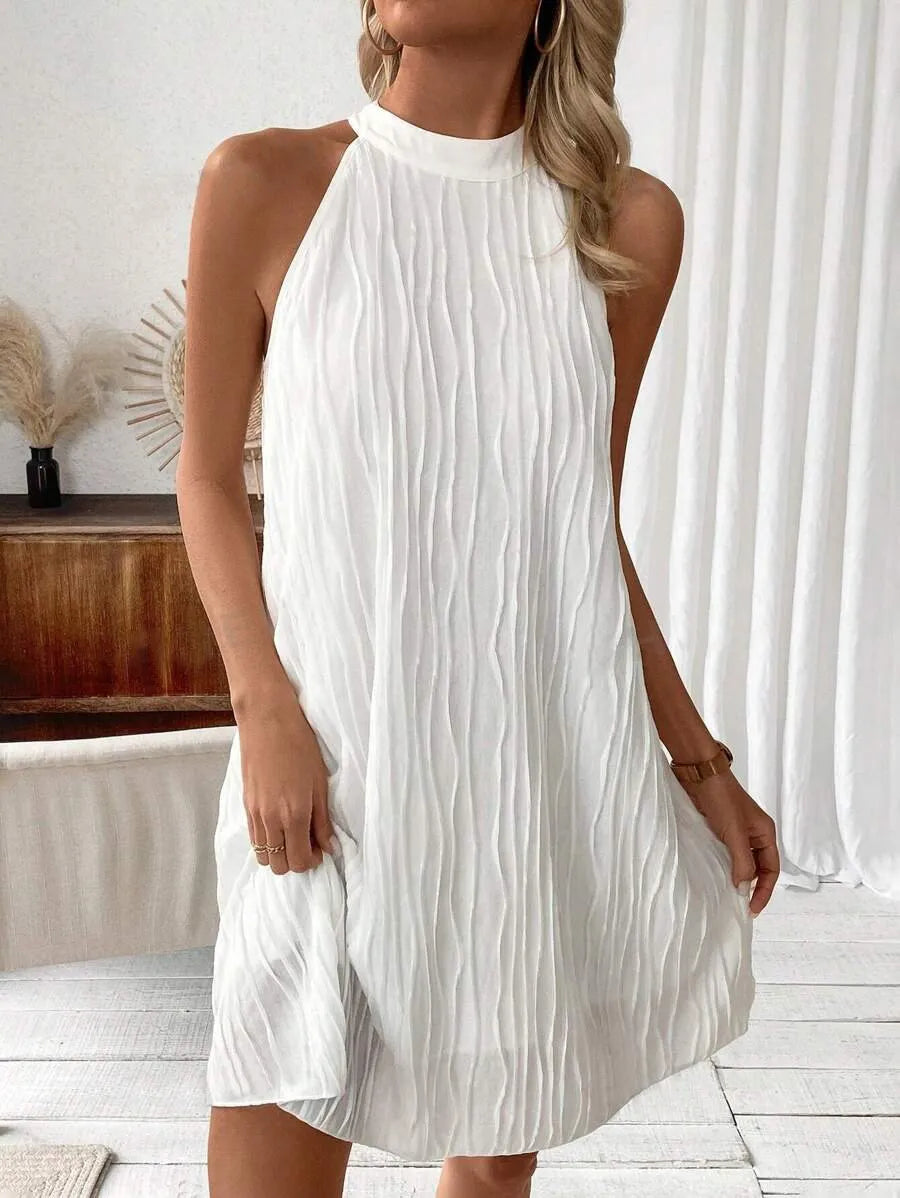 Elsie - Captivating sleeveless backless mini dress